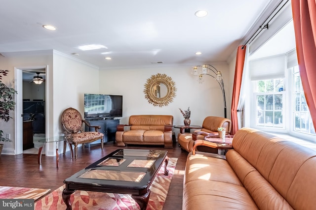living room featuring ornamental molding, recessed lighting, and wood finished floors