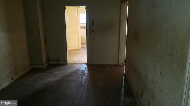 unfurnished room featuring wood finished floors