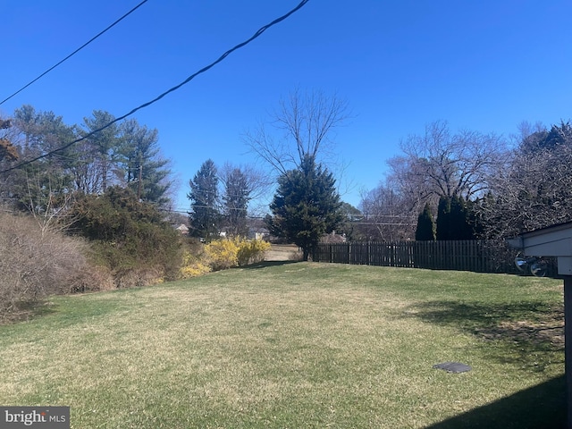 view of yard with fence