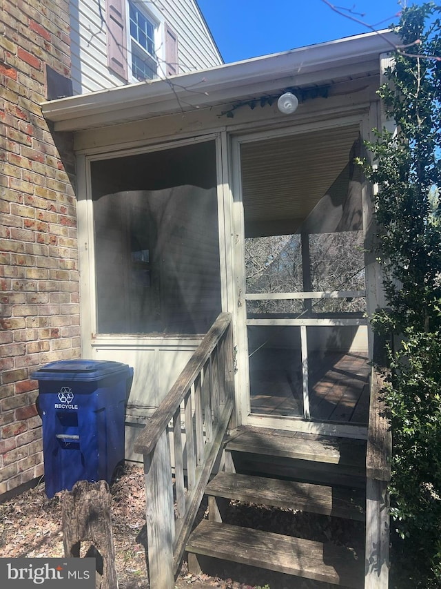 exterior space with brick siding