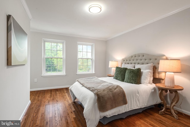 2192 Golf Course Dr, Reston, VA 20191 - bedroom featuring crown molding, wood finished floors, and baseboards
