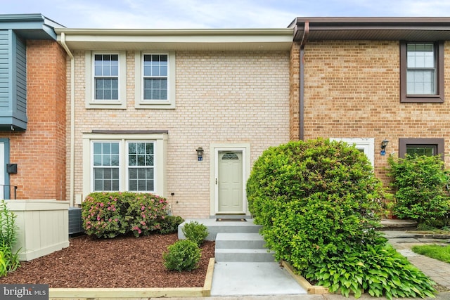 2192 Golf Course Dr, Reston, VA 20191 - townhome / multi-family property featuring brick siding