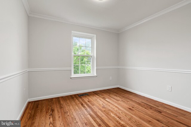 2192 Golf Course Dr, Reston, VA 20191 - empty room with ornamental molding, light wood-style floors, and baseboards