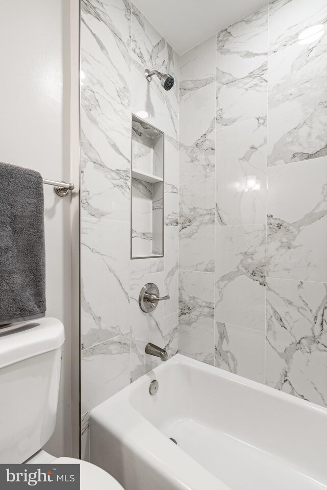 2192 Golf Course Dr, Reston, VA 20191 - bathroom featuring toilet and tub / shower combination