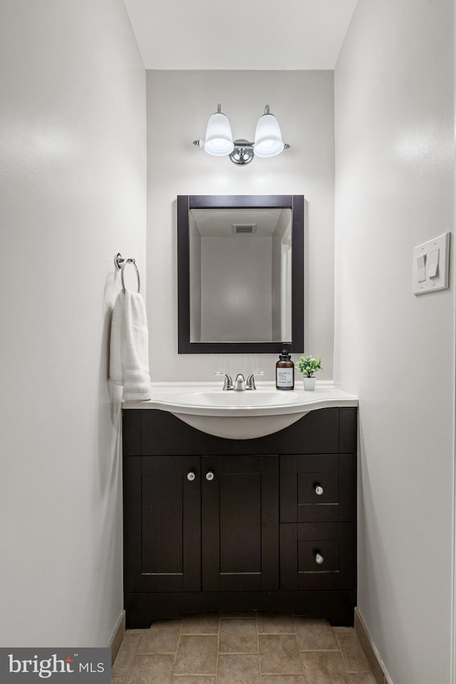 2192 Golf Course Dr, Reston, VA 20191 - bathroom featuring vanity and baseboards