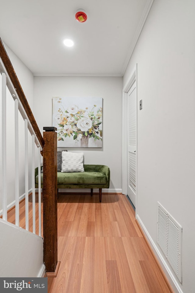 2192 Golf Course Dr, Reston, VA 20191 - entrance foyer with light wood-style floors, stairway, recessed lighting, crown molding, and baseboards