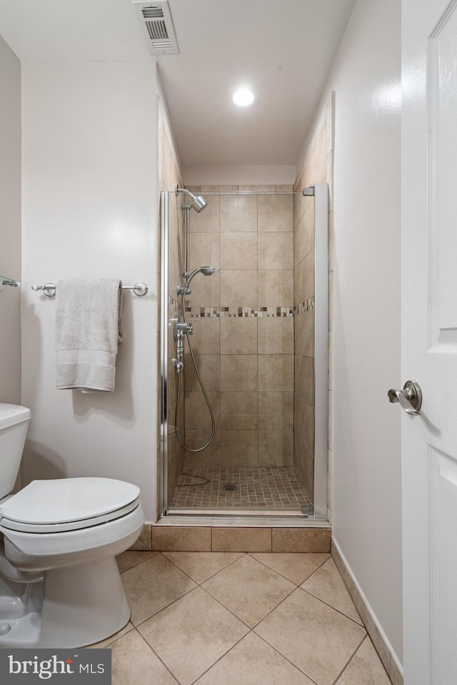 2192 Golf Course Dr, Reston, VA 20191 - full bathroom with toilet, a stall shower, tile patterned flooring, and baseboards