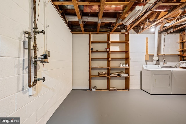 2192 Golf Course Dr, Reston, VA 20191 - unfinished basement featuring washer and dryer and concrete block wall