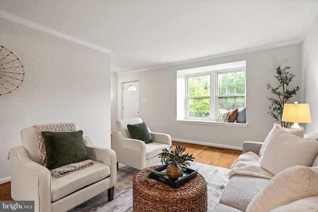 2192 Golf Course Dr, Reston, VA 20191 - living area with wood finished floors, ornamental molding, and baseboards