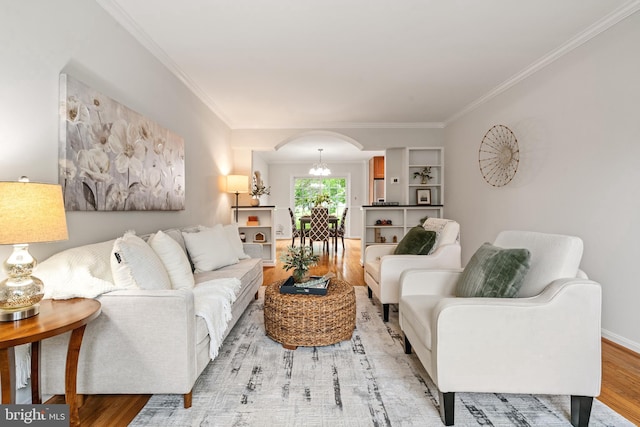 2192 Golf Course Dr, Reston, VA 20191 - living area featuring arched walkways, crown molding, and light wood-type flooring