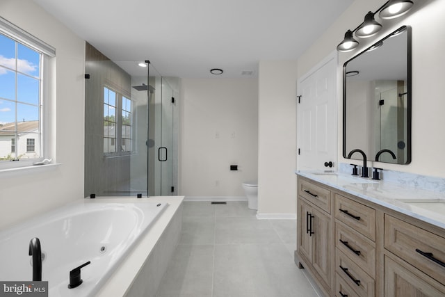 183 Mccormick Blvd, Newark, DE 19702 - full bathroom with a shower stall, double vanity, healthy amount of natural light, and a whirlpool tub
