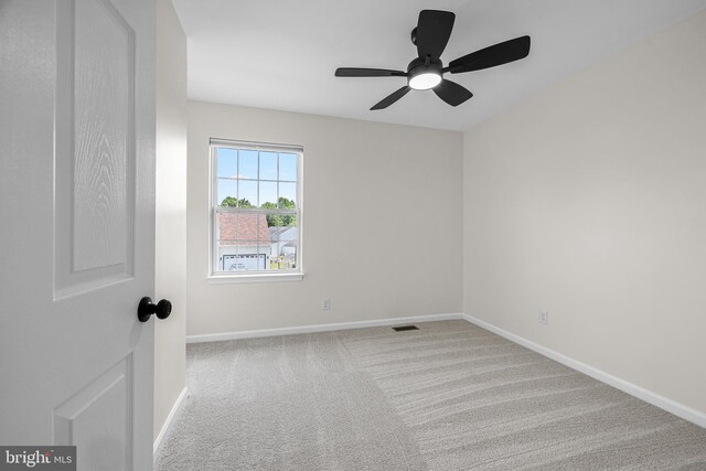 183 Mccormick Blvd, Newark, DE 19702 - carpeted spare room with baseboards and a ceiling fan