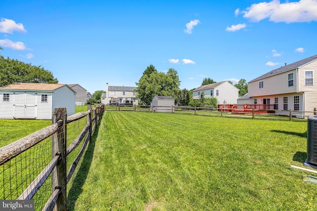183 Mccormick Blvd, Newark, DE 19702 - fenced backyard with a storage unit and a residential view