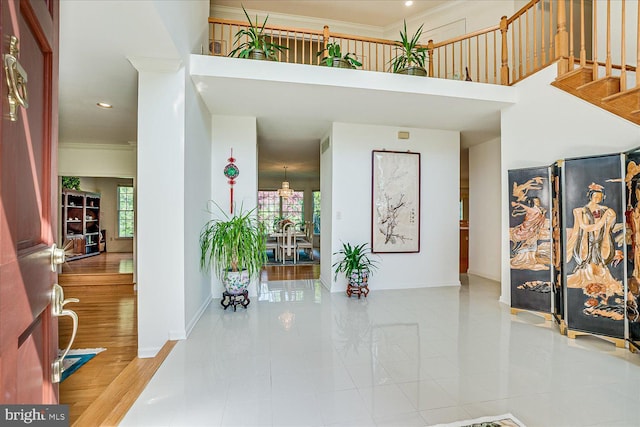 30 Revere Ct, Princeton Junction, NJ 08550 - common area featuring crown molding, a high ceiling, stairway, and recessed lighting