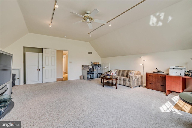30 Revere Ct, Princeton Junction, NJ 08550 - living area featuring track lighting, carpet, vaulted ceiling, a ceiling fan, and a desk
