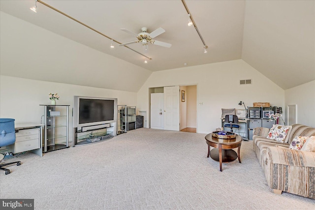 30 Revere Ct, Princeton Junction, NJ 08550 - carpeted living room with track lighting, vaulted ceiling, ceiling fan, and a desk