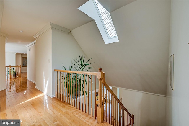 30 Revere Ct, Princeton Junction, NJ 08550 - stairway featuring hardwood / wood-style floors, a skylight, and baseboards