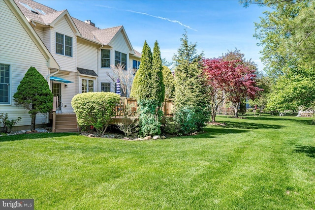 30 Revere Ct, Princeton Junction, NJ 08550 - view of green lawn featuring a wooden deck