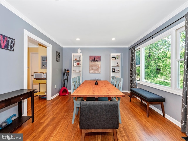 7915 Mount Pleasant Ct E, Walkersville, MD 21793 - recreation room with baseboards, light wood-style floors, and crown molding