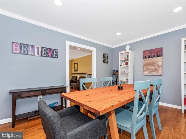 7915 Mount Pleasant Ct E, Walkersville, MD 21793 - dining area with crown molding, recessed lighting, and wood finished floors