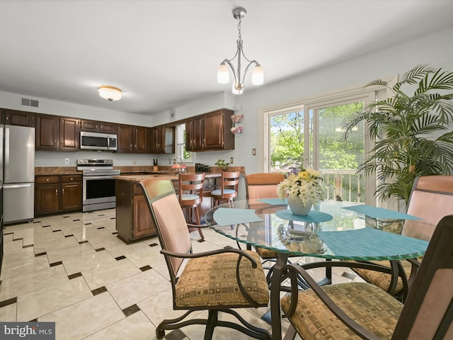 dining space with visible vents