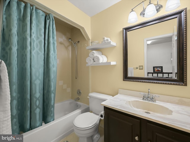 full bathroom featuring vanity, toilet, and shower / tub combo with curtain