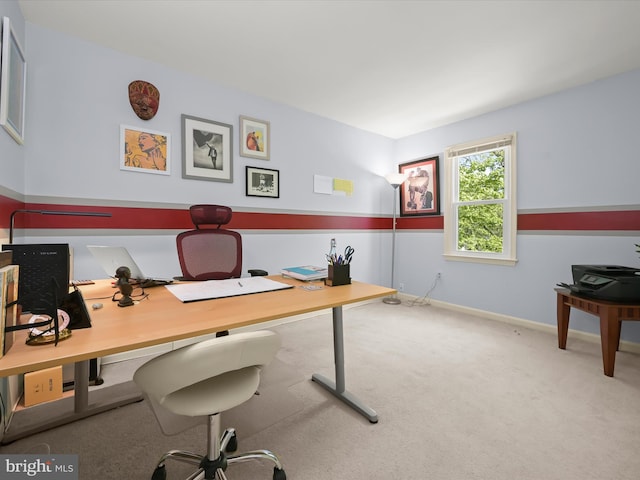 office with baseboards and carpet