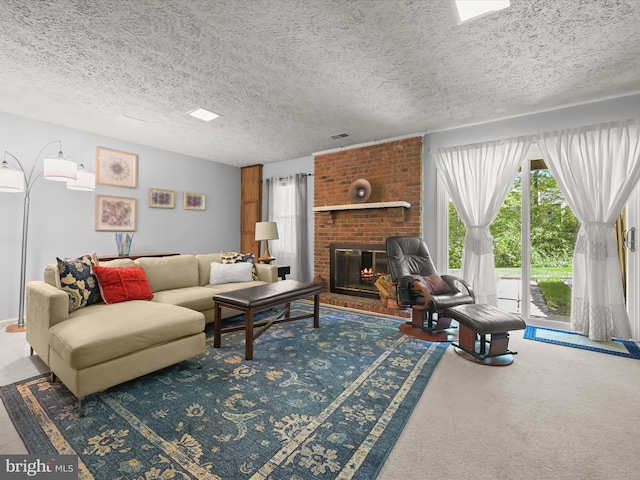 living area featuring carpet floors, a textured ceiling, visible vents, and a brick fireplace