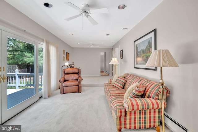 carpeted living room featuring visible vents, a ceiling fan, baseboards, recessed lighting, and a baseboard radiator