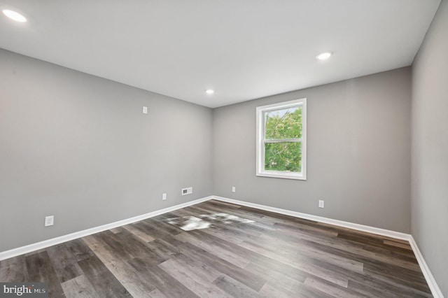 1954 Sponson St, Baltimore, MD 21230 - empty room featuring baseboards, dark wood finished floors, and recessed lighting