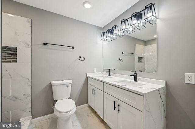 1954 Sponson St, Baltimore, MD 21230 - bathroom featuring marble look tiles, toilet, baseboards, a shower, and double vanity