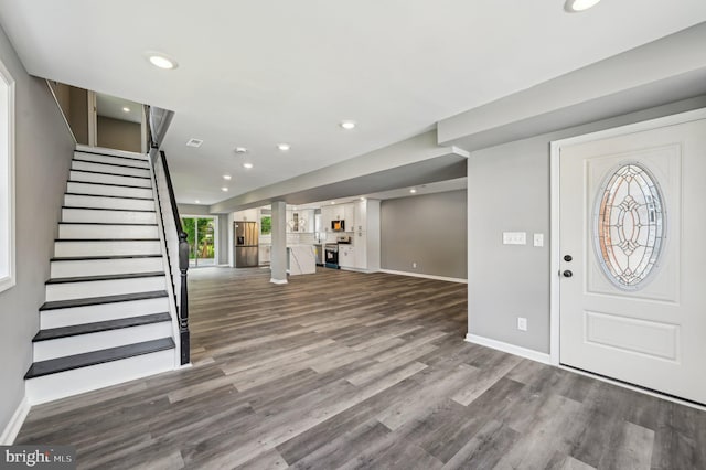 1954 Sponson St, Baltimore, MD 21230 - entrance foyer with recessed lighting, wood finished floors, baseboards, and stairs