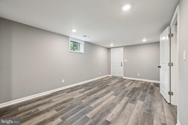1954 Sponson St, Baltimore, MD 21230 - basement with wood finished floors, baseboards, and recessed lighting