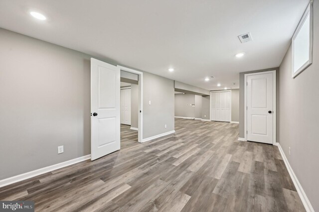 1954 Sponson St, Baltimore, MD 21230 - finished basement with recessed lighting, baseboards, visible vents, and wood finished floors