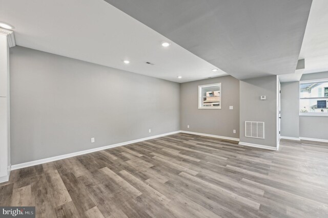 1954 Sponson St, Baltimore, MD 21230 - basement featuring recessed lighting, baseboards, visible vents, and wood finished floors