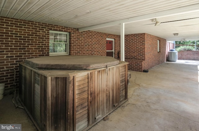 view of patio featuring a hot tub