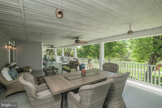 view of patio / terrace featuring a ceiling fan and outdoor dining space