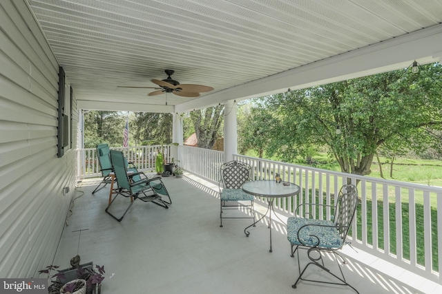 view of patio / terrace featuring a ceiling fan and a porch