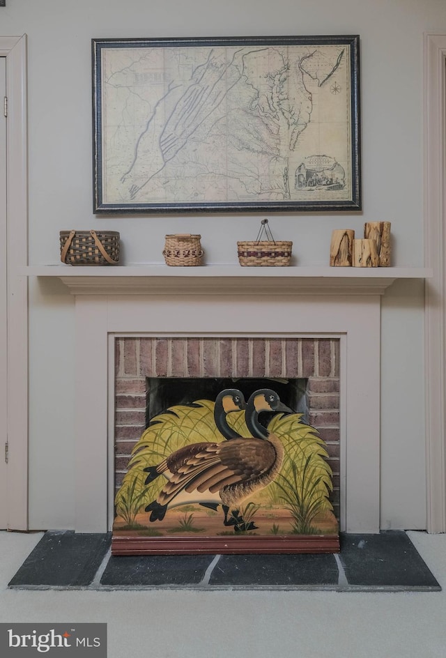 interior details featuring a fireplace