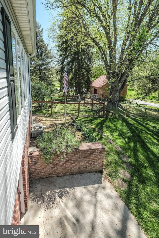 view of yard with a patio area and fence