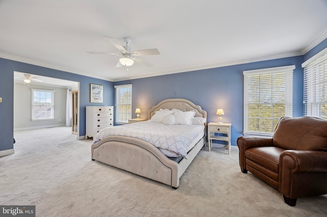 bedroom featuring baseboards, ornamental molding, and carpet floors