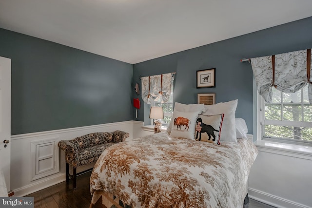 bedroom featuring wood finished floors