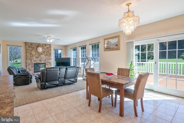 1249 Canon Way, Westminster, MD 21157 - dining space with light carpet, a wealth of natural light, and a fireplace