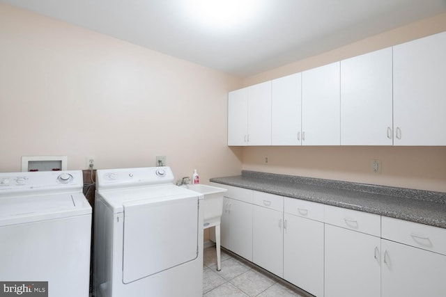 1249 Canon Way, Westminster, MD 21157 - laundry area with light tile patterned floors, cabinet space, and washing machine and clothes dryer