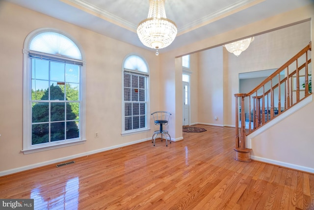1249 Canon Way, Westminster, MD 21157 - foyer with crown molding, stairs, a chandelier, and wood finished floors