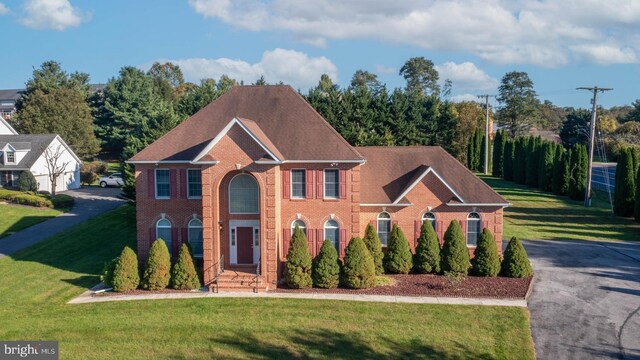 1249 Canon Way, Westminster, MD 21157 - colonial house with driveway, a front lawn, and brick siding