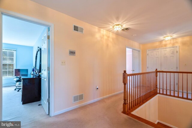 1249 Canon Way, Westminster, MD 21157 - corridor featuring visible vents, baseboards, carpet floors, and an upstairs landing