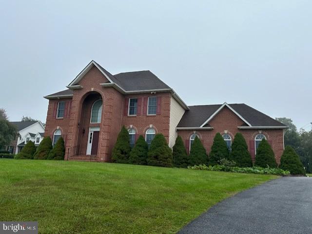 1249 Canon Way, Westminster, MD 21157 - colonial inspired home with brick siding and a front yard