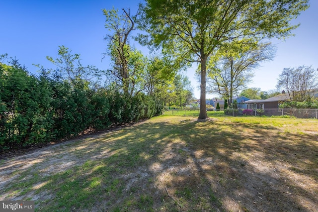 view of yard featuring fence