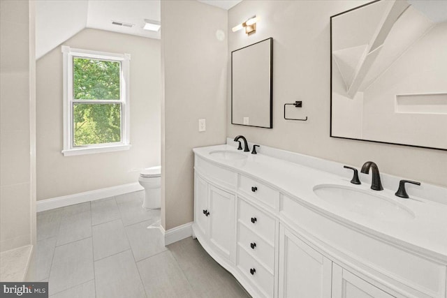 7746 Emerson Burrier Rd, Mount Airy, MD 21771 - bathroom with toilet, baseboards, vaulted ceiling, and a sink